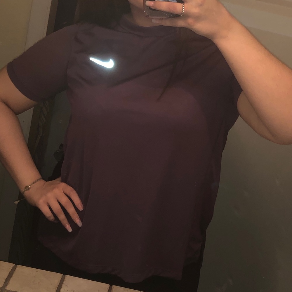 Purple dri fit Nike shirt